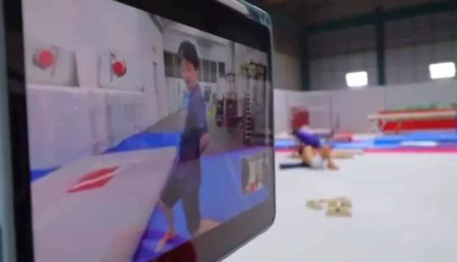 Accompanying gymnastics team at competition event